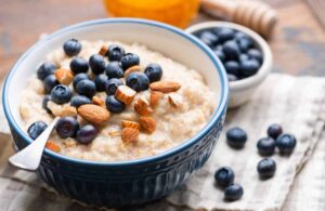 Oatmeal with blueberries and almonds in a bowl.